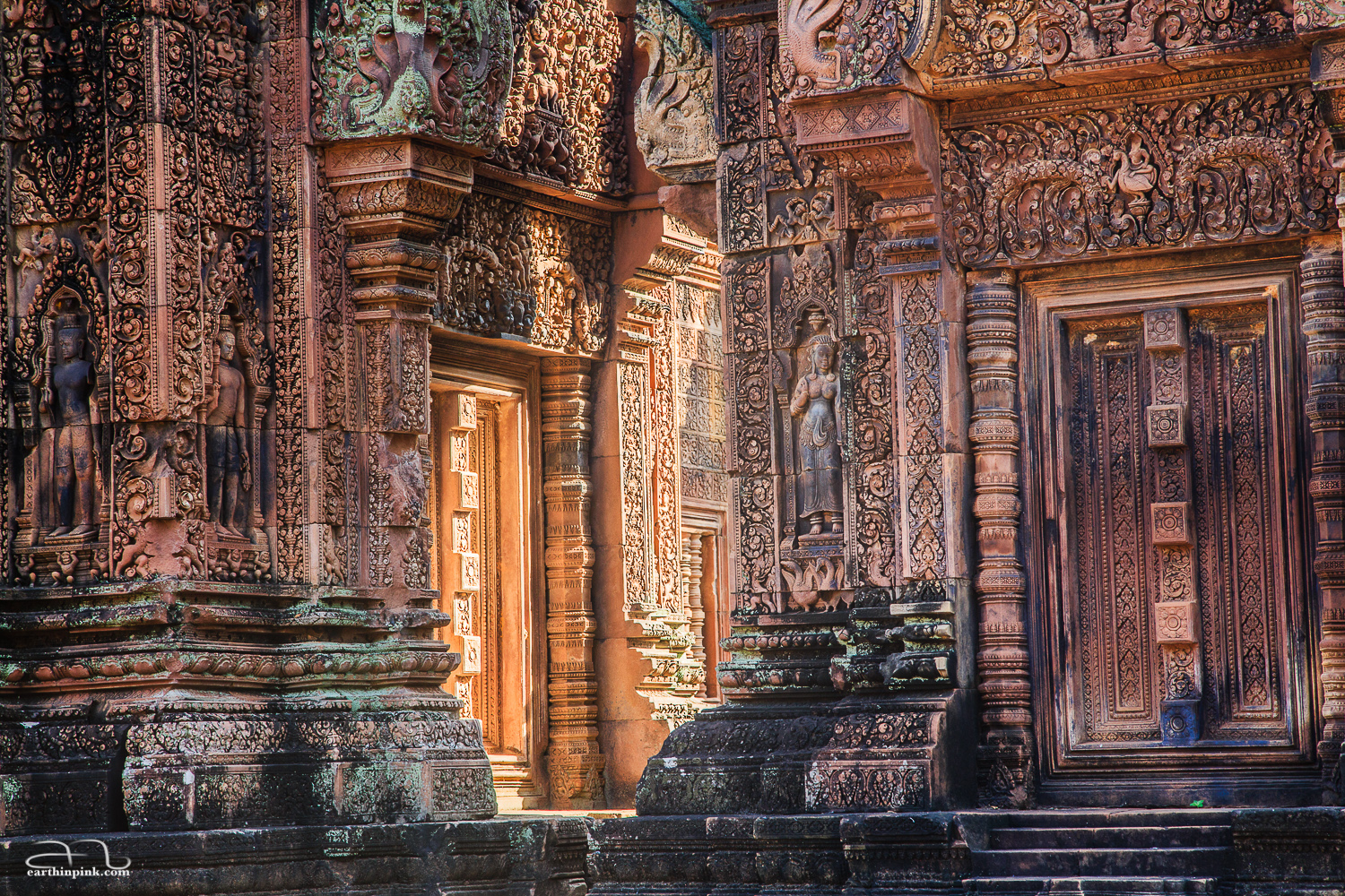 Intricate, delicate carvings of Banteay Srei in the morning light.