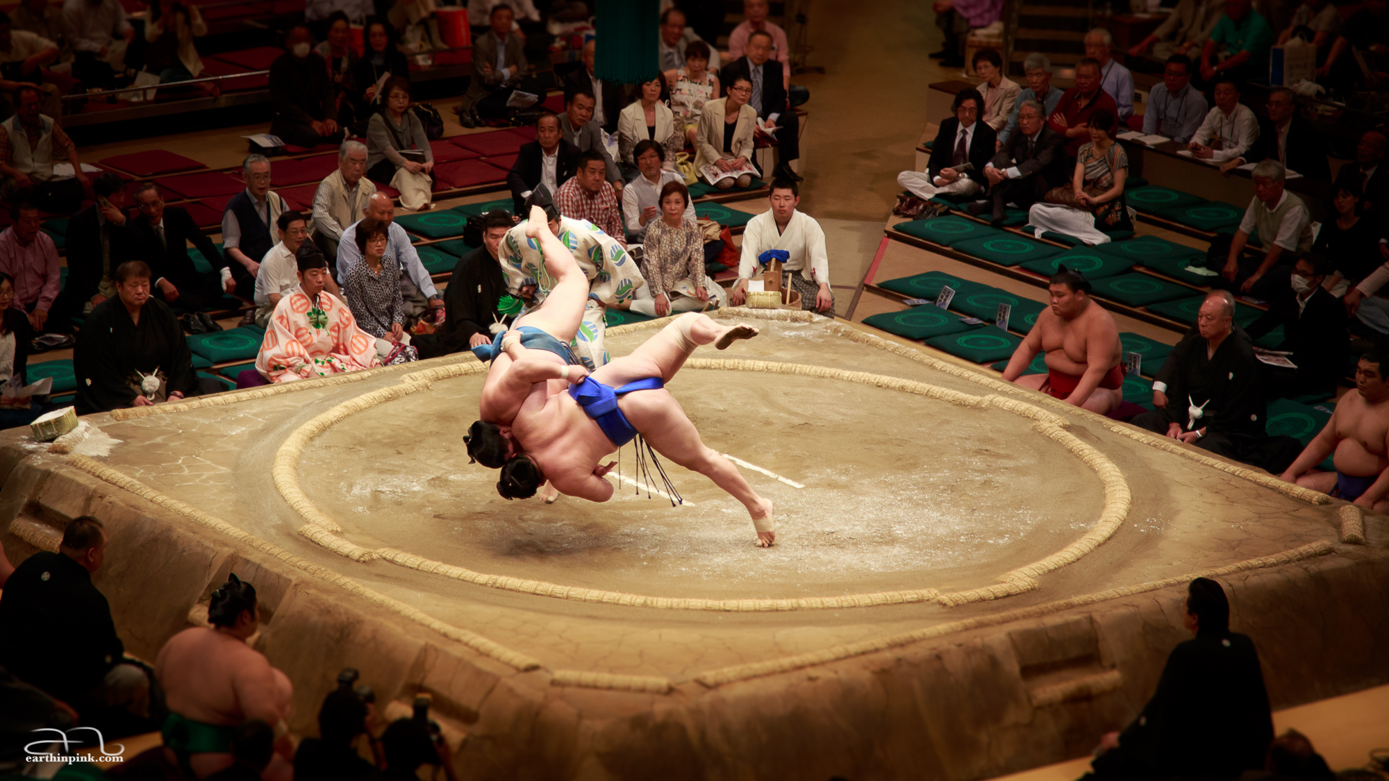 An unusually action-packed sumo wrestle at the tournament in Tokyo in May 2014. Most fights are over in the blink of an eye with one of the wrestlers stepping outside the ring, but this was a captivating exception.